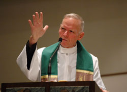 Augustinian Father Denis Wilde, associate director of Priests for Life, based in Staten Island, N.Y., preaches the homily during Mass on Jan. 23 at Our Lady of the Greenwood Church in Greenwood. (Photo by Mary Ann Wyand)