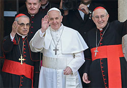 Pope Francis addresses the world for the first time from the central balcony of St. Peter's Basilica at the Vatican March 13. Cardinal Jorge Mario Bergoglio of Argentina was elected the 266th Roman Catholic pontiff. (CNS photo/Paul Haring)