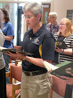 Benedictine sisters Mary Nicolette Etienne, left, and Heather Jean Foltz, right, pray with fellow members of Our Lady of Grace Monastery in Beech Grove in the community’s chapel. Both sisters seek God in the life that they share with other Benedictine sisters living in community. (Photo by Katie Chrisman)