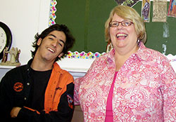 Grant Bishop and Christina Flum share a moment of joy together during a recent session of “Faith, Fun and Friends”—a weekly program at the Aquinas Center in Sellersburg, a resource center for the New Albany Deanery. Flum leads the program that is designed to enhance the Catholic faith of people with special needs in the deanery. (Submitted photo)