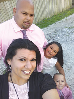 Gricelda and Tomas Nuñez pose with their children Liliana and Leonardo prior to the Easter Vigil at St. Joseph Church in Shelbyville on April 15. (Submitted photo)