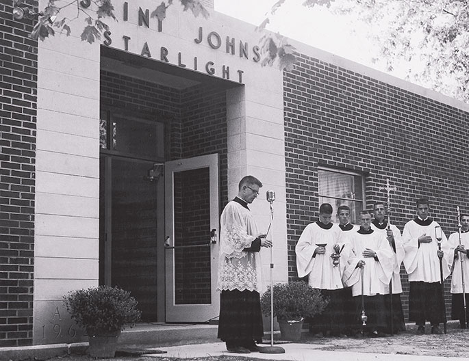 This photo shows a flag raising event at St. Mary School in North Vernon. Though no date is given on the photo, it could depict celebrations related to the dedication of the school building by Bishop Denis O’Donoghue, former auxiliary bishop of Indianapolis, on June 21, 1908. St. Mary Parish was founded in 1861, and the school continues to operate in the building shown in this photograph.