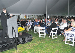 Archbishop Charles C. Thompson speaks on Sept. 17 before nearly 200 supporters of Bishop Simon Bruté College Seminary in Indianapolis. The “Celebrate Bruté” event took place on the grounds of the archdiocesan college seminary. (Photo by Sean Gallagher)