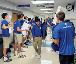 As another school year begins, upper class students at Bishop Chatard High School in Indianapolis welcome first-year students into their school family on Aug. 9. (Submitted photo)