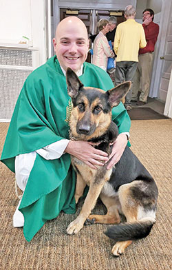 Father Adam Ahern calls Bella, his 2-year-old German Shepherd, “a great blessing in my priesthood and a gift from God.” (Submitted photo)